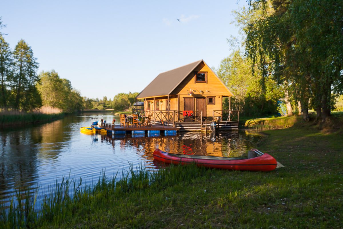 A small raft house on a summer evening